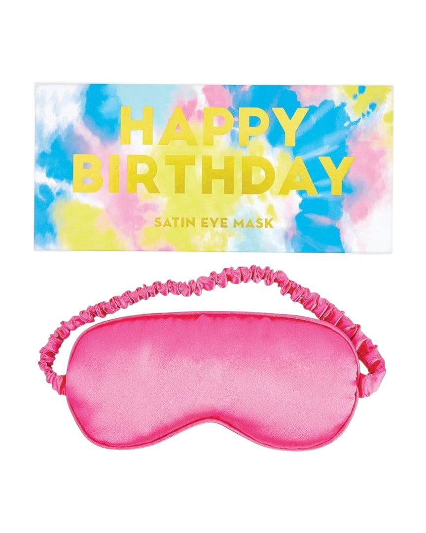 Pink satin eye mask with 'Happy Birthday' satin eye mask packaging in the background