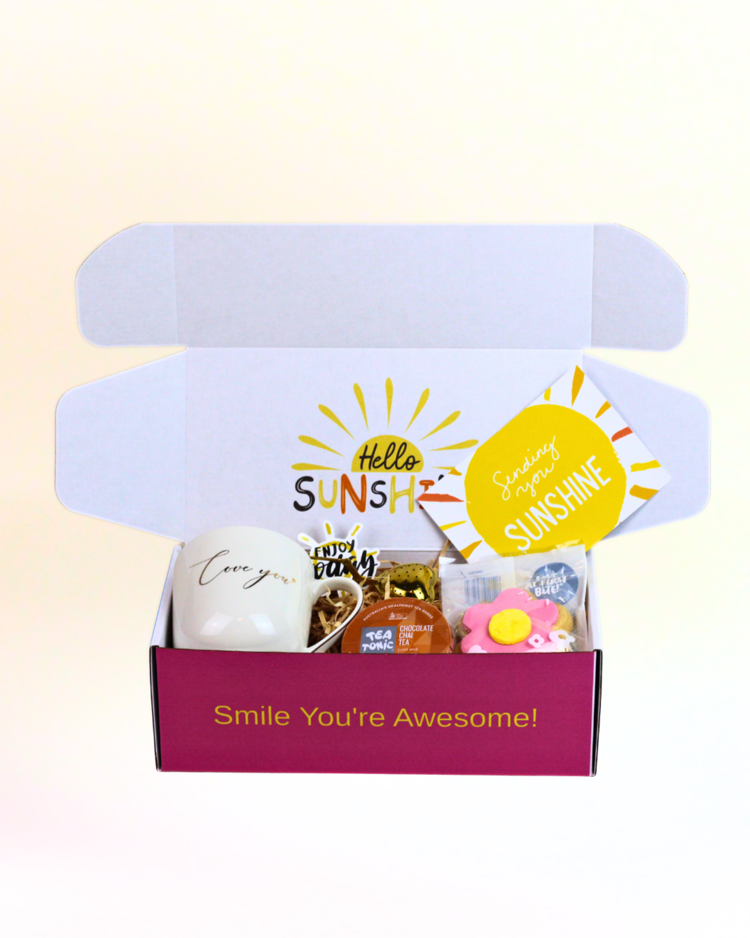 A Box-Full A Cup of Love Gift Box with Love You bone china mug, Tea Total loose-leaf tea, gold heart tea infuser, Molly Woppy daisy cookie and sunshine gift box.