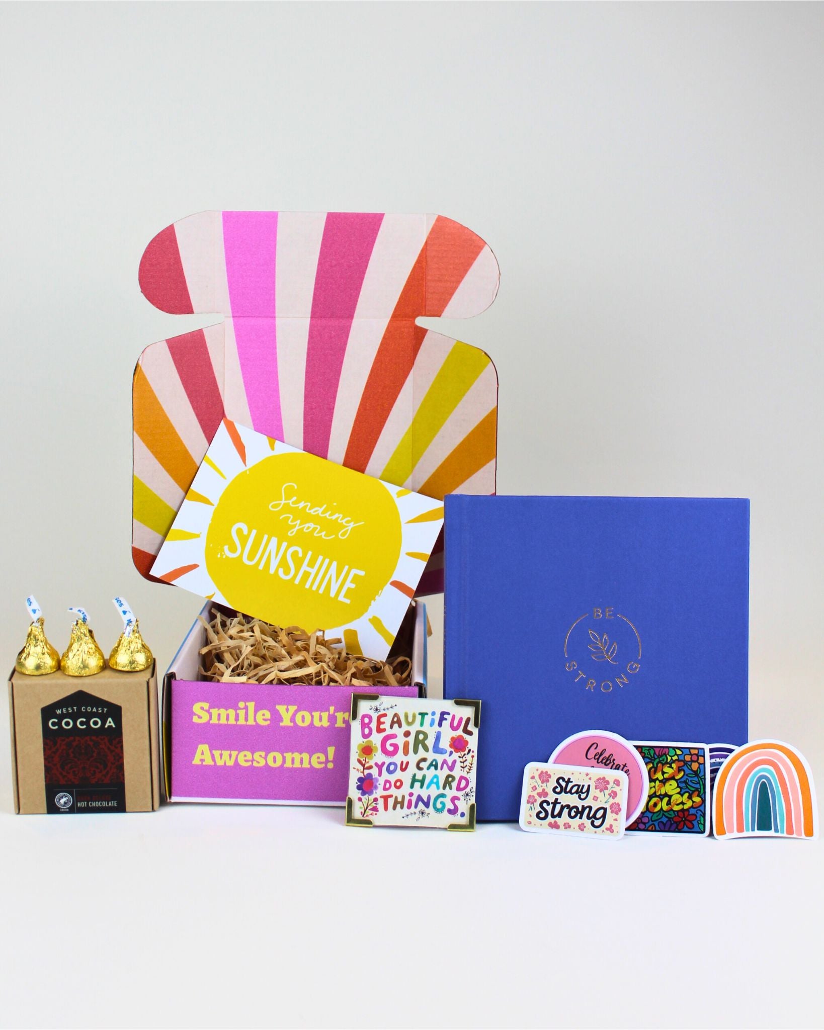 Be Strong Gift Box featuring an encouragement quote book, decadent hot chocolate, and a “Beautiful Girl You Can Do Hard Things” magnet — a thoughtful, uplifting gift from Fun & Thoughtful Gift Boxes NZ and Unique Gift Boxes New Zealand