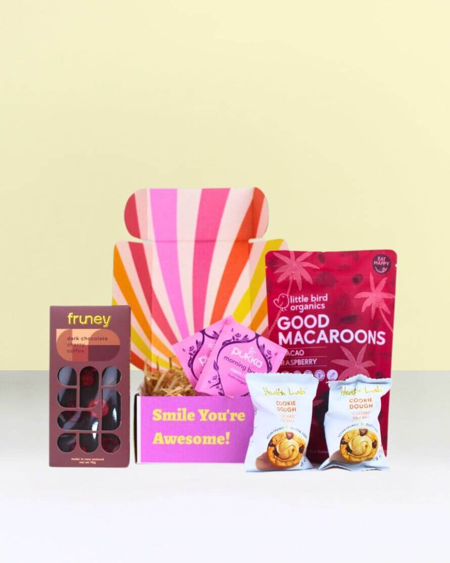 Vegan and Gluten Free Gift Box NZ with chocolate, bliss balls, macaroons, and Pukka Berry Tea, perfect for birthdays, thank-yous, and special occasions.