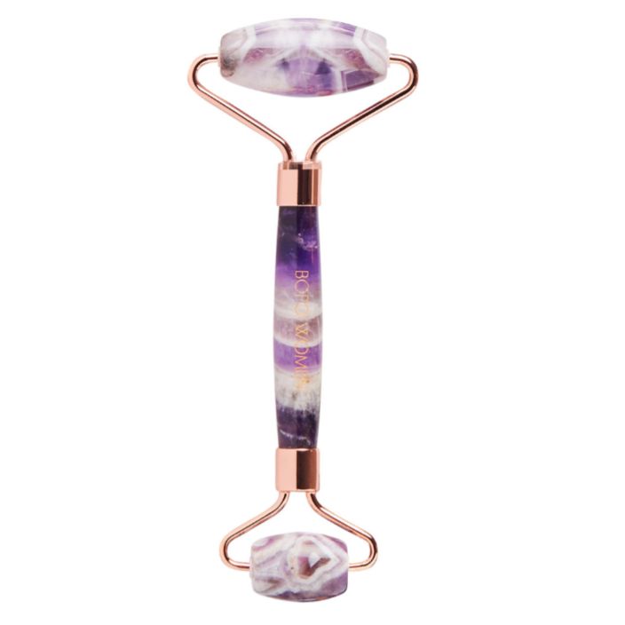 Bopo Women amethyst facial roller – a natural crystal tool for promoting circulation, relaxation, and glowing skin. Perfect for pamper boxes, self-care routines, and thoughtful wellbeing gifts NZ. Ideal for skincare enthusiasts and crystal lovers.