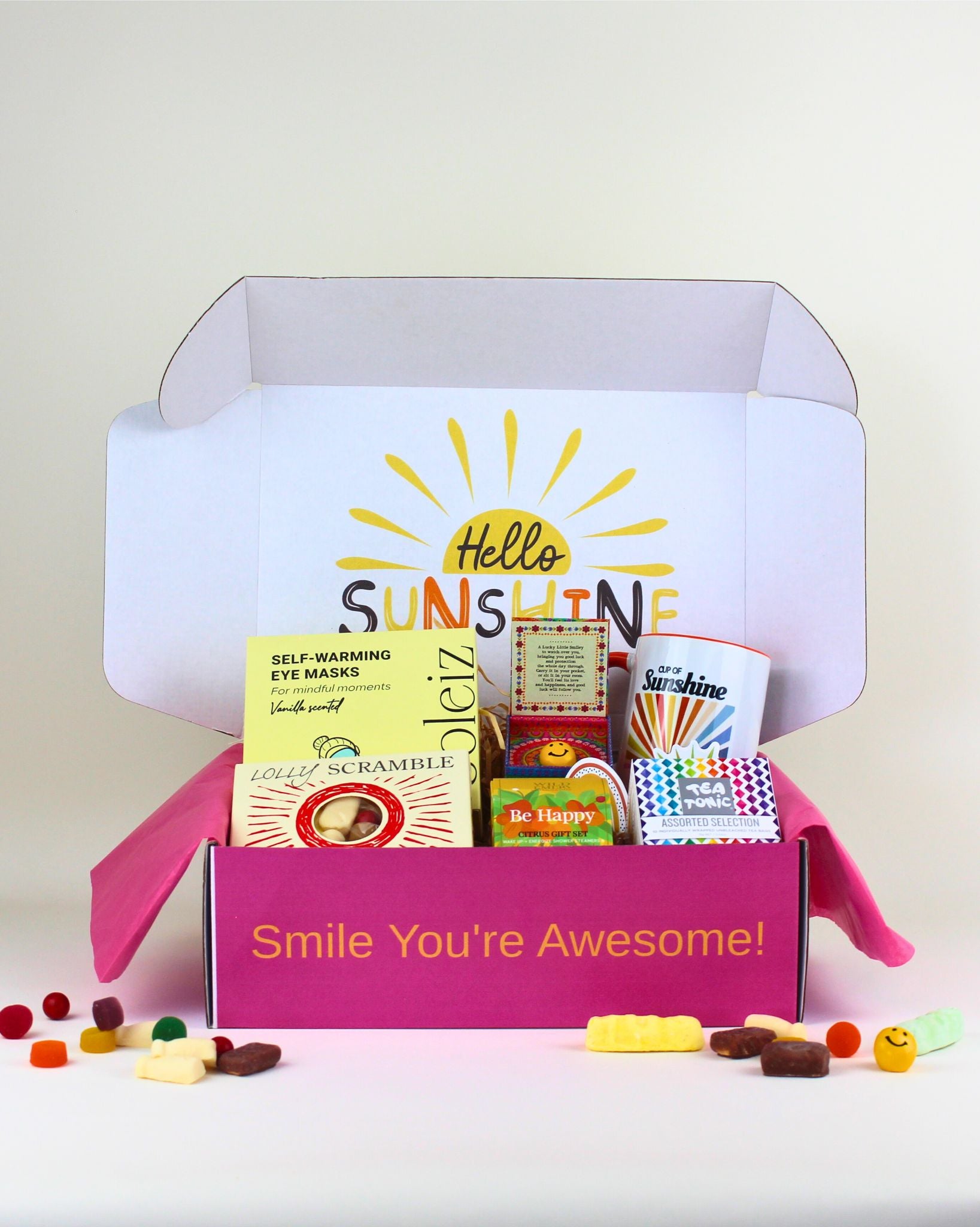 A bright and uplifting Box Full of Sunshine featuring self-care essentials, herbal teas, a sunshine mug, kiwi lollies, and a personalised card — a fun gift box for positivity NZ.
