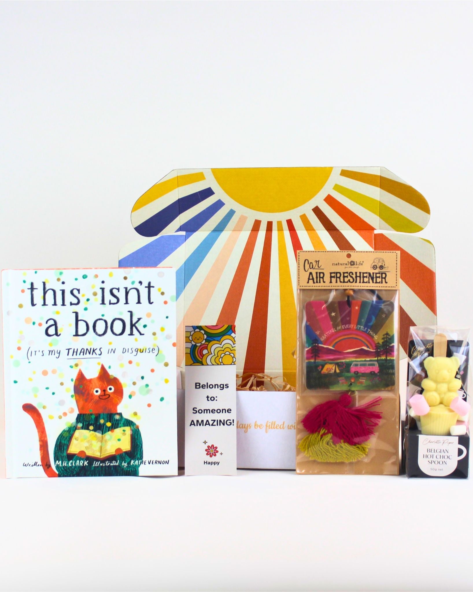 “Box Full of Thanks gift set with quirky thank-you book, gratitude air freshener, and hot chocolate spoon.”