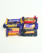 Indulge in a variety of 6 Cadbury Chocolate Favourites, perfect for gifting, sharing, or adding to a sweet treat gift box. Made in New Zealand, these classic chocolates bring joy to any chocolate lover.