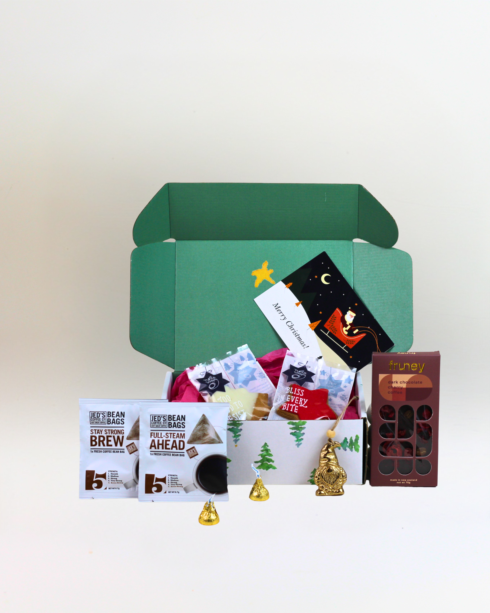 Christmas Coffee Break $47.99 gift box with Jed’s coffee, Molly Woppy festive cookies, dark chocolate and brass Christmas tree keepsake