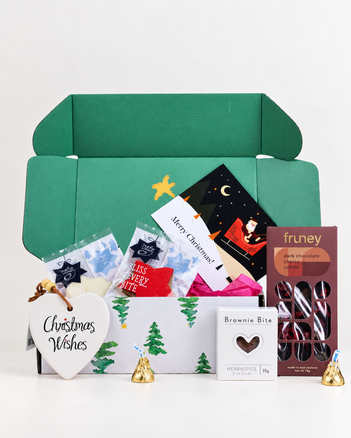 Christmas cheer, boxed up for $49.99. Festive Molly Woppy cookies, dark chocolate cherry & coffee chocolate, an indulgent brownie and a ceramic Christmas Wishes keepsake, all beautifully presented for Christmas.