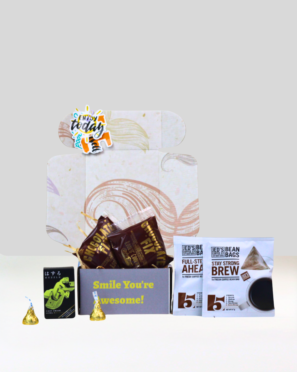 Coffee Break gift box NZ with Jed’s coffee bags, Huzzle puzzle, Cookie Time cookies and Hershey’s Kisses
