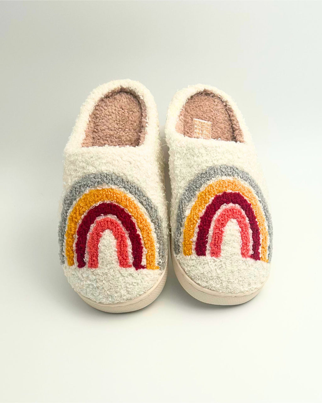 These cozy rainbow slippers are colourful, soft, and comfortable, making them an ideal addition to loungewear or a thoughtful gift for any occasion.
