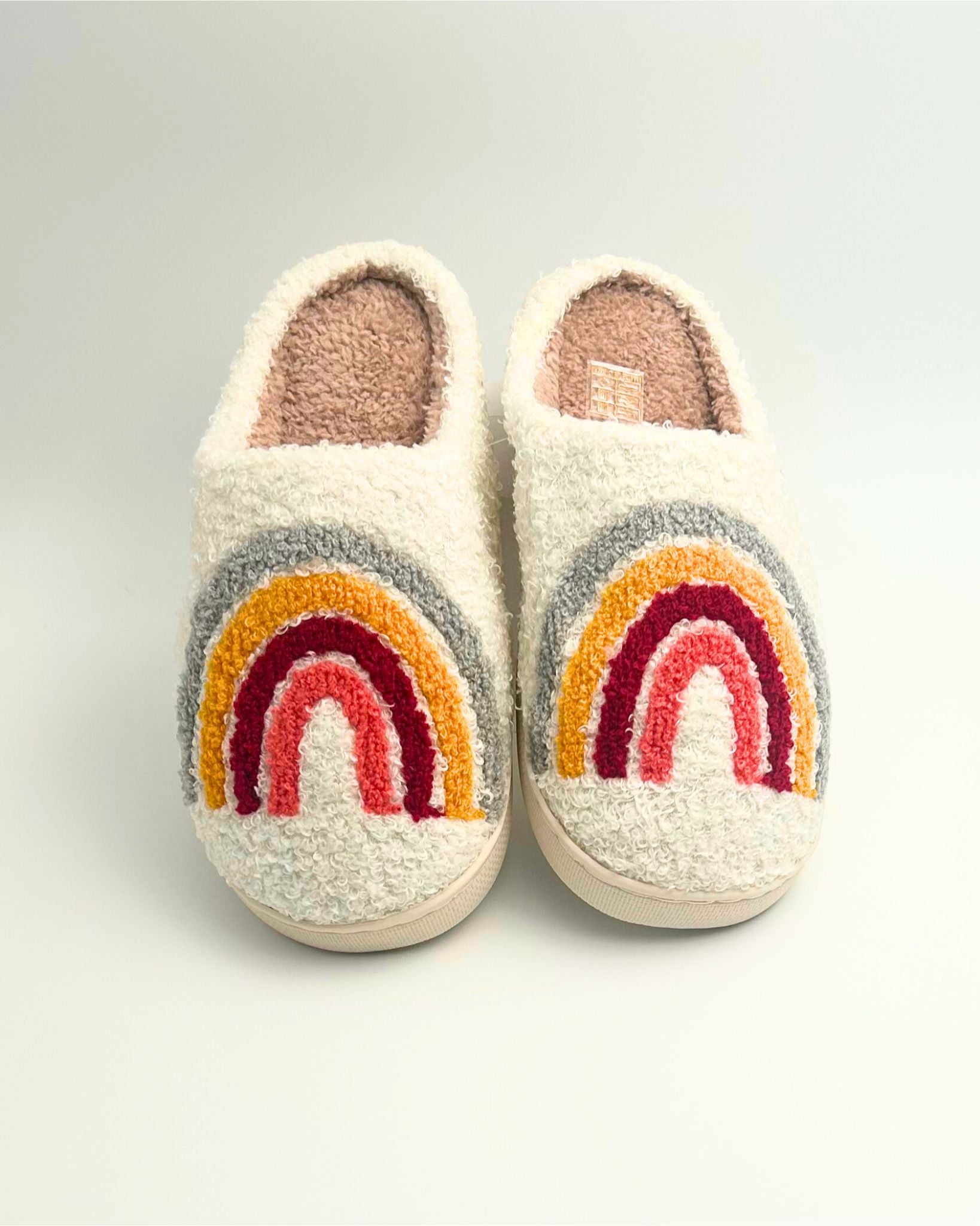 These cozy rainbow slippers are colourful, soft, and comfortable, making them an ideal addition to loungewear or a thoughtful gift for any occasion.