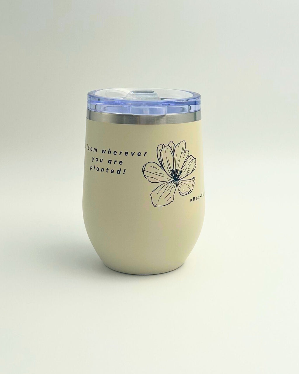 Ecru Keep Cup with ‘Bloom Wherever You Are Planted’ print – ceramic-lined, insulated, and stainless steel outer. Perfect for coffee or tea lovers, ideal for gift boxes, thoughtful gifts, and wellbeing gifts NZ. Stylish, practical, and inspiring for daily use.