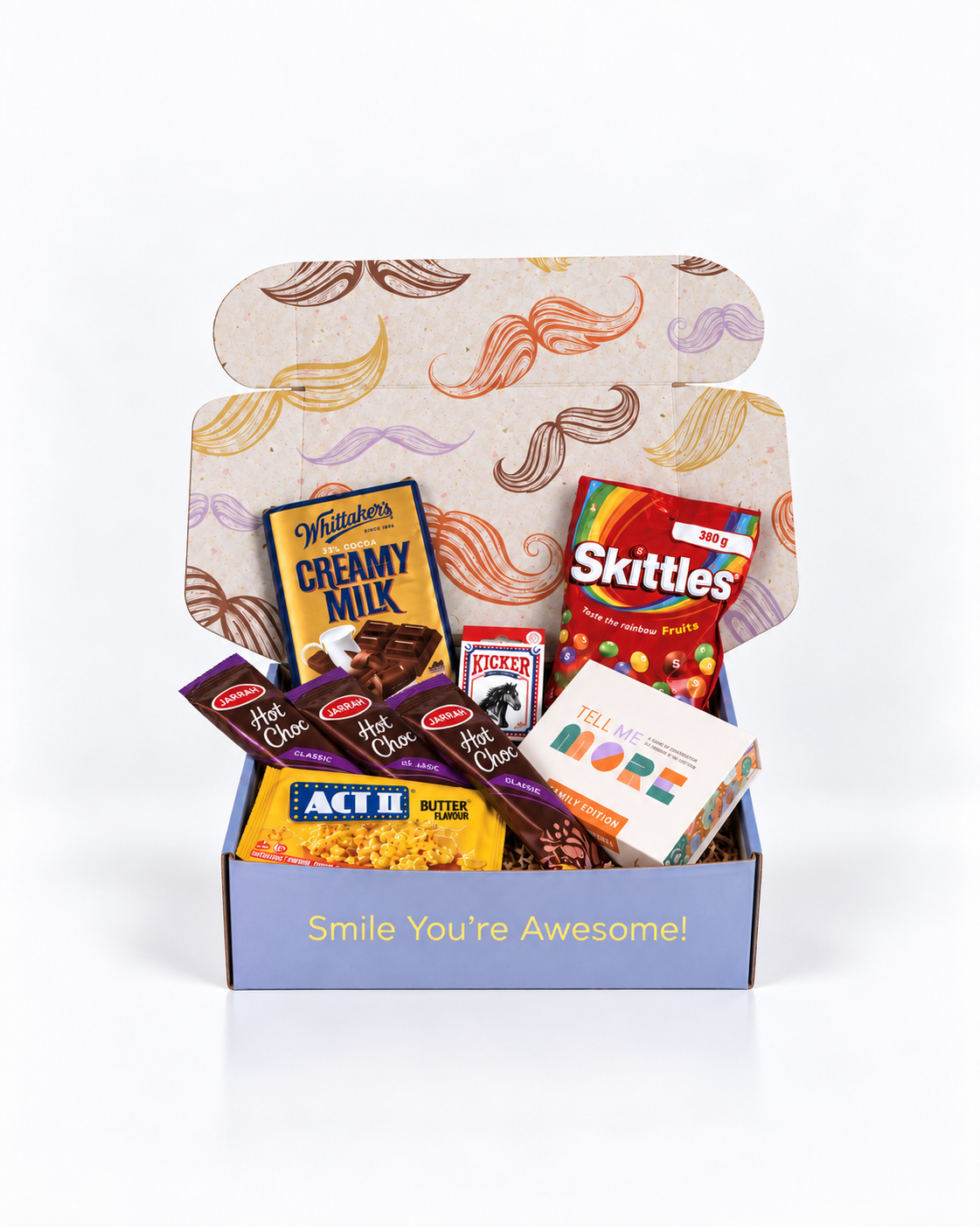Family Fun Gift Box NZ featuring Whittaker’s Creamy Milk chocolate, Skittles, ACT II popcorn, three Jarrah hot chocolate sachets, Kicker chocolate and Tell Me More Family Edition conversation cards in a colourful gift box.