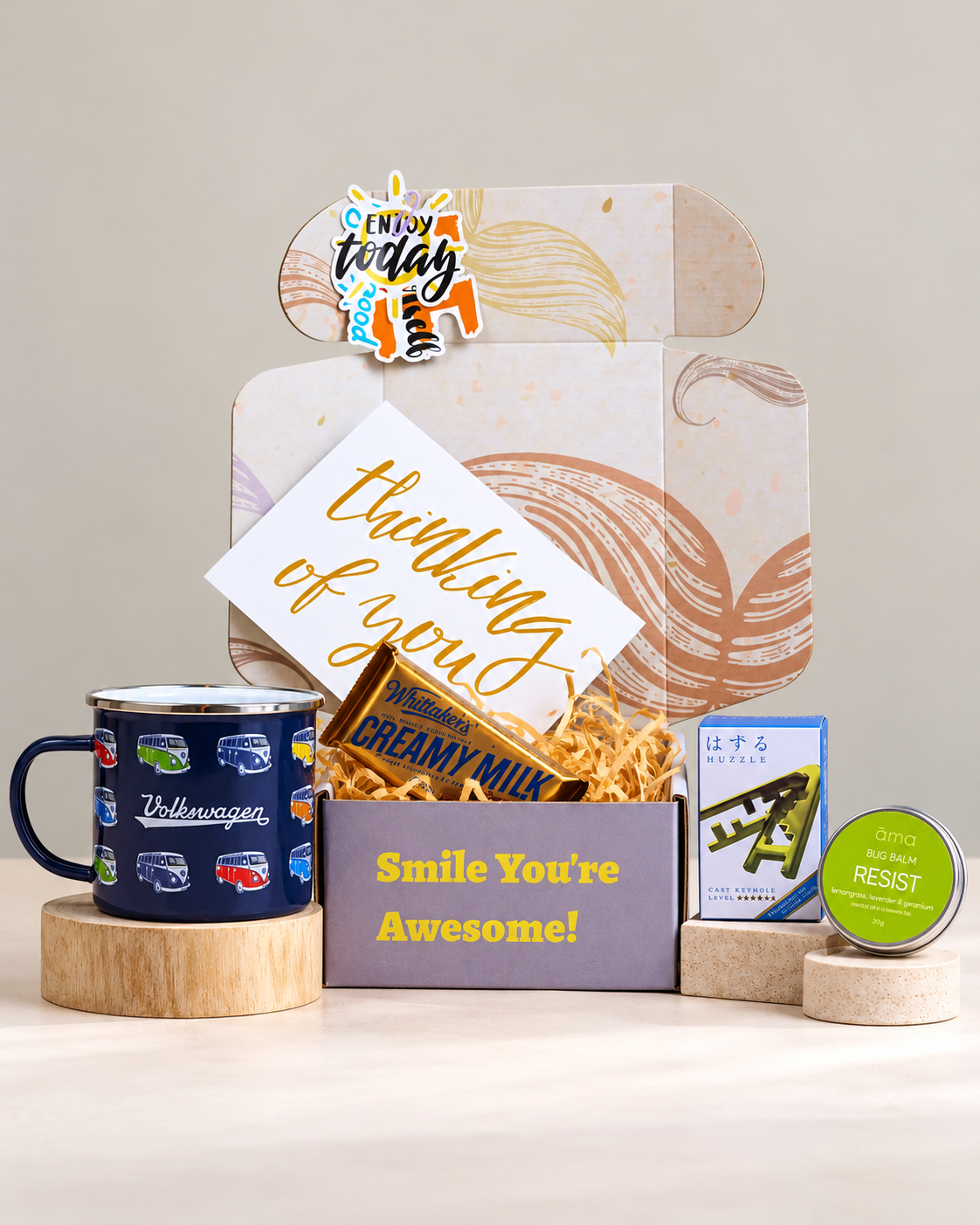 For the Camper Gift Box NZ by A Box-Full featuring a Volkswagen campervan mug, Whittaker's chocolate, Huzzle puzzle, natural bug balm and personalised card. A thoughtful camping gift for him or her, delivered NZ wide.