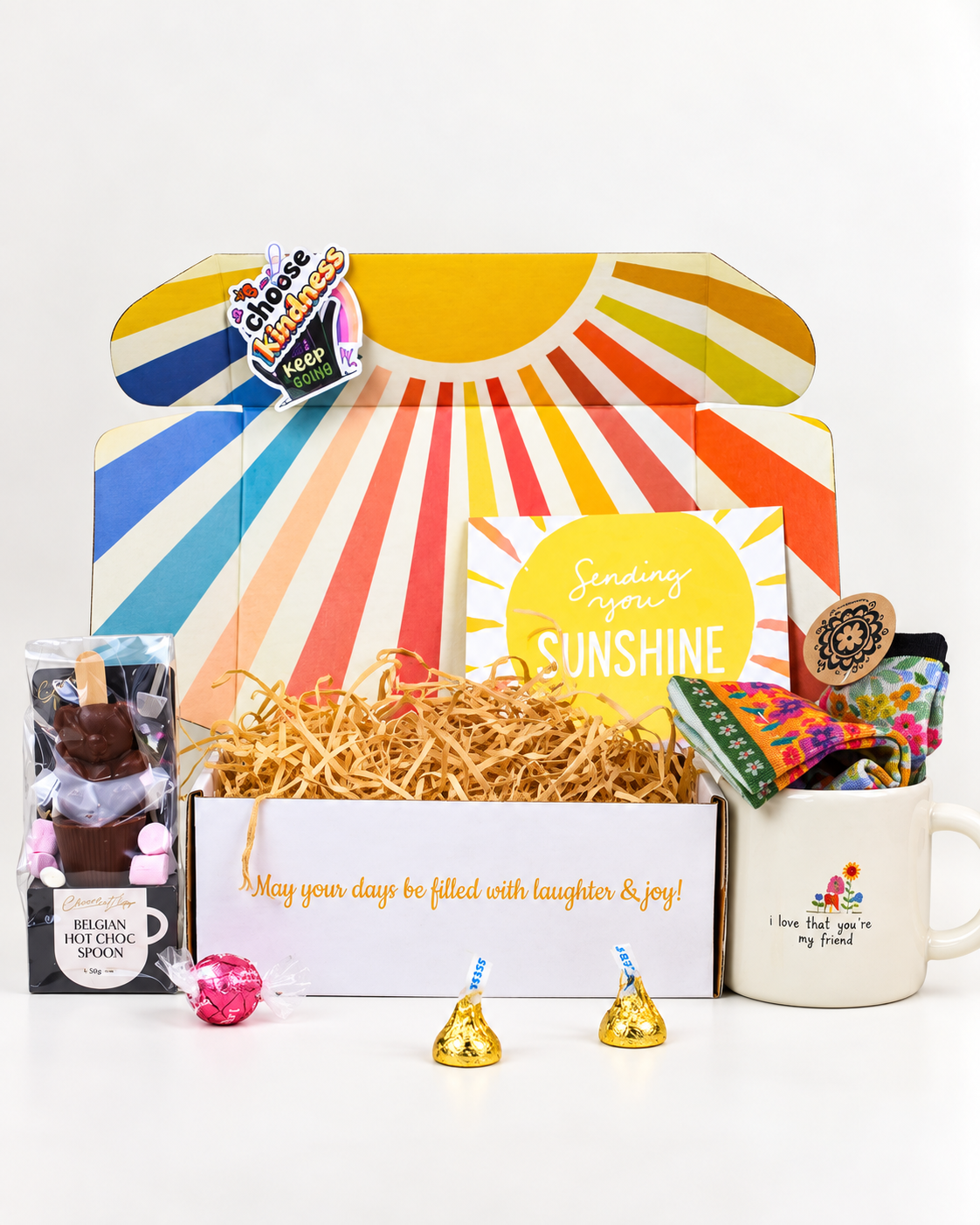 I Love That You're My Friend gift box with friendship mug, floral socks, hot chocolate spoon, Lindor chocolate and Hershey's Kisses.