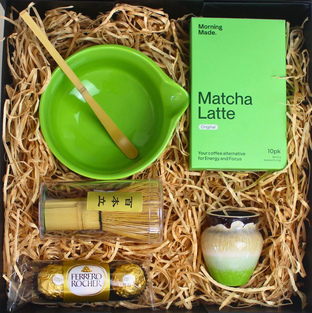 Close-up of the handmade Japanese ceramic matcha bowl paired with an eco-friendly bamboo whisk, ideal for traditional matcha preparation.