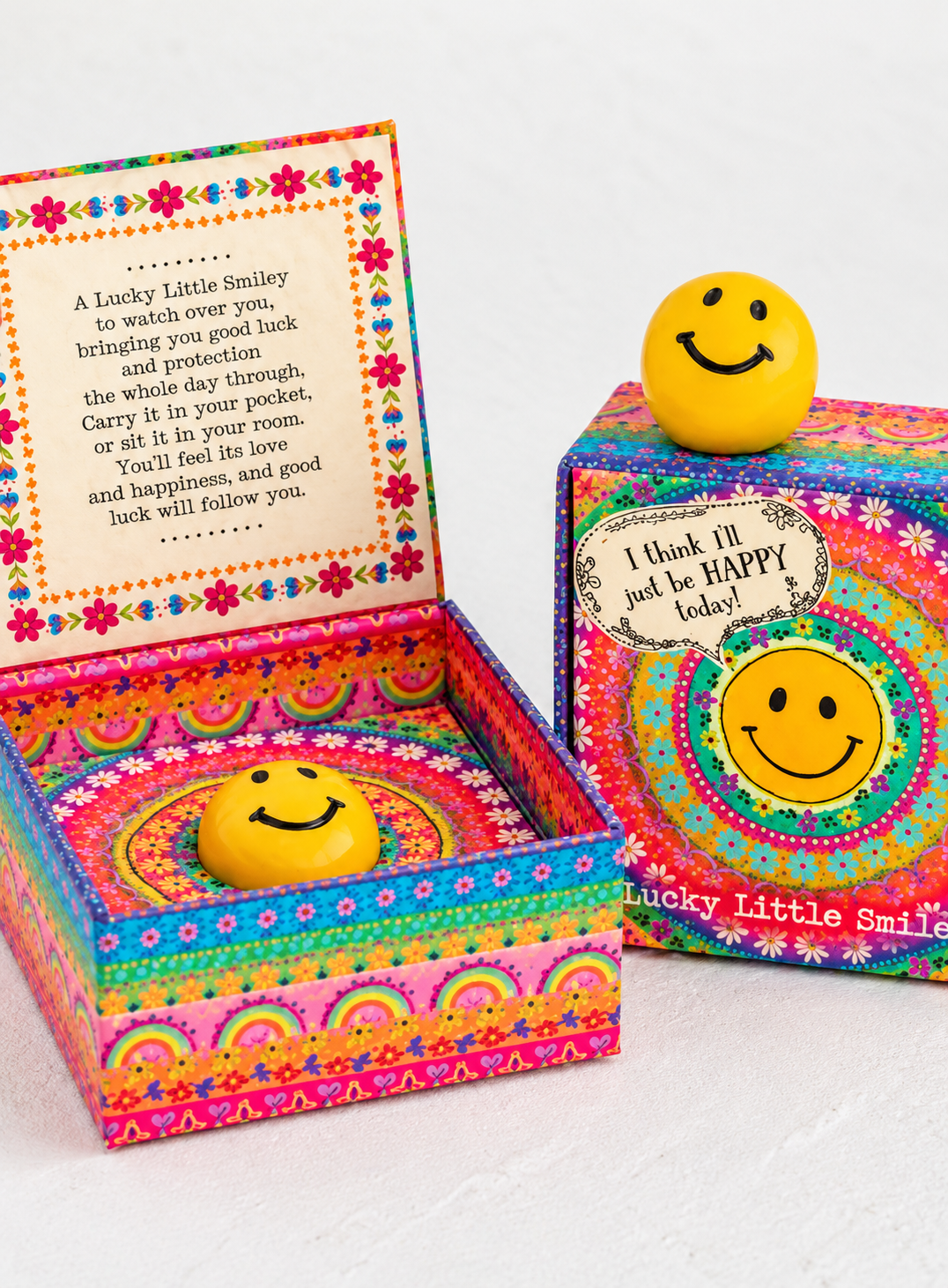 Lucky Charm smiley keepsake with an uplifting message, available as an A Box-Full gift box add-on.