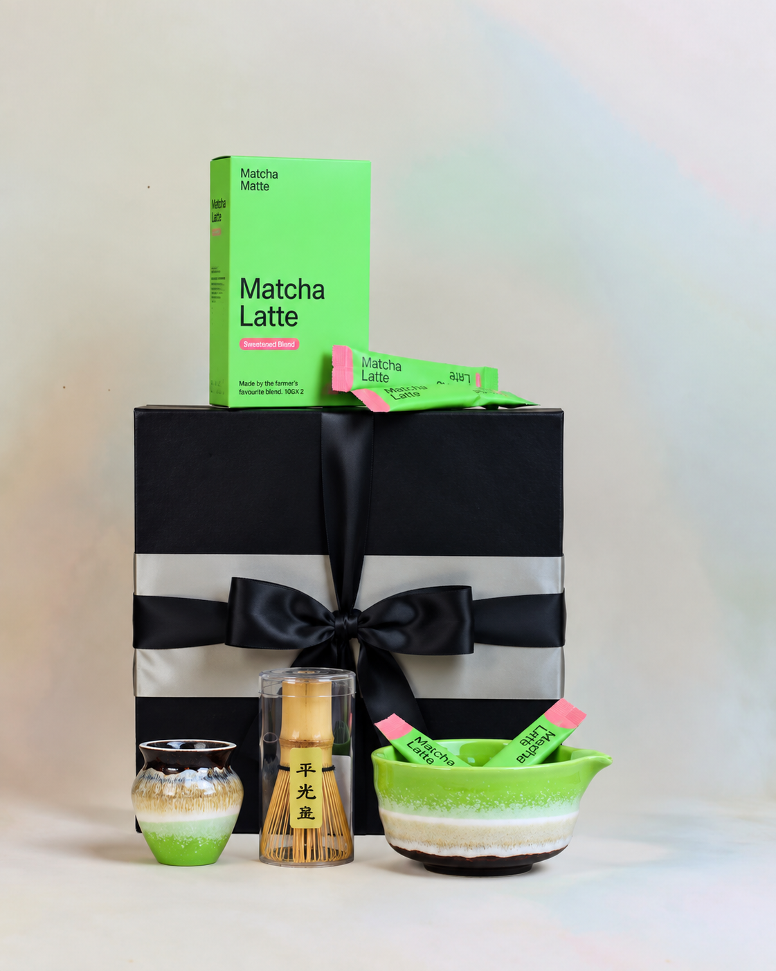 Matcha Gift Box NZ with green and brown ceramic matcha bowl set, bamboo whisk and matcha latte
