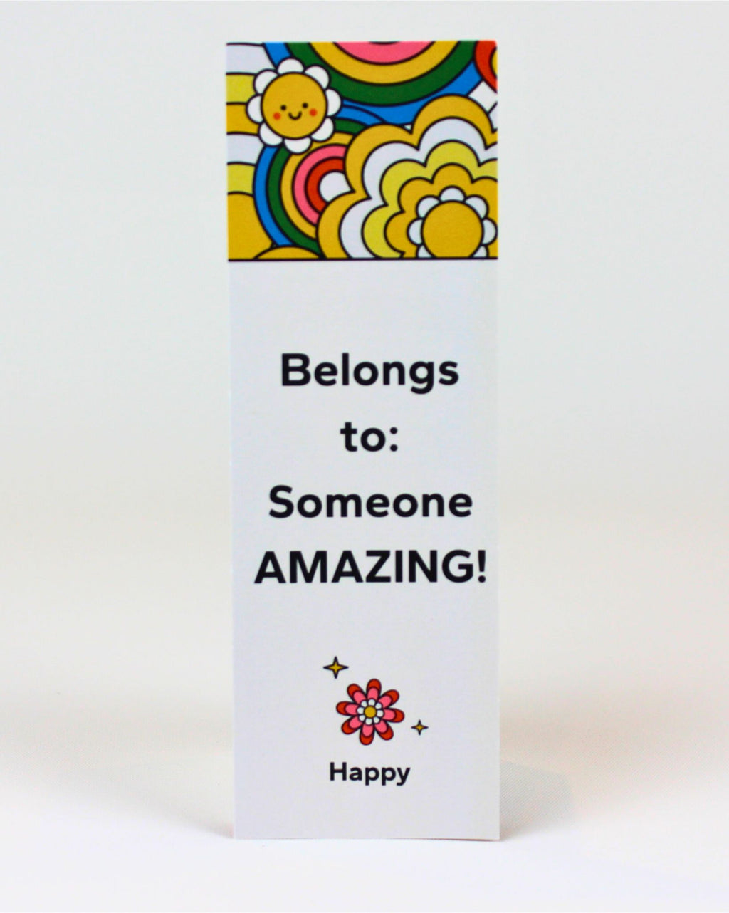 “An uplifting bookmark with the message ‘This Belongs to Someone Amazing,’ designed as a thoughtful and inspiring add-on gift for curated gift boxes, hampers, or care packages.”