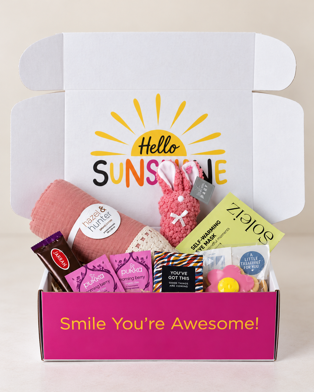 New Mum and Baby Gift Box NZ with baby wrap, pink bunny, tea, chocolate and self care gifts for mum