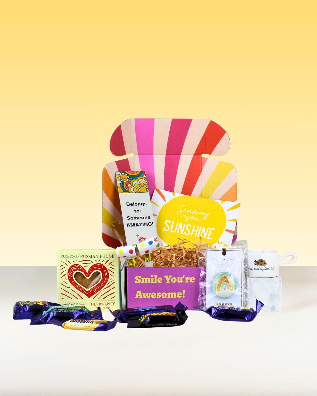 Birthday Gifts NZ Fun Celebration Box with Cadbury Favourites chocolates, Russian fudge, birthday keepsakes, and personalised card in Smile You Are Awesome box