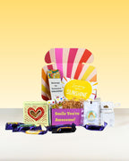 Birthday Gifts NZ Fun Celebration Box with Cadbury Favourites chocolates, Russian fudge, birthday keepsakes, and personalised card in Smile You Are Awesome box