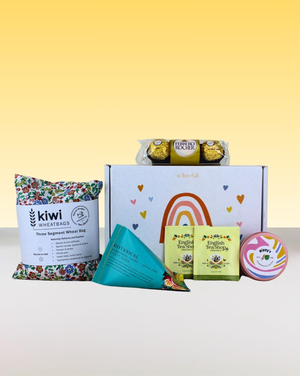 Wellbeing gift box NZ with kiwi wheatbag, botanical foot soak, chocolates, herbal tea & personalised card.