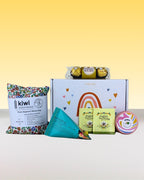 Wellbeing gift box NZ with kiwi wheatbag, botanical foot soak, chocolates, herbal tea & personalised card.
