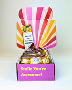 Brighten someone’s day with our Petite Choccy Cheer Box, packed with delicious chocolate treats and fun surprises. Perfect for gifting, sharing, or adding a touch of sweetness to any occasion, made in New Zealand.