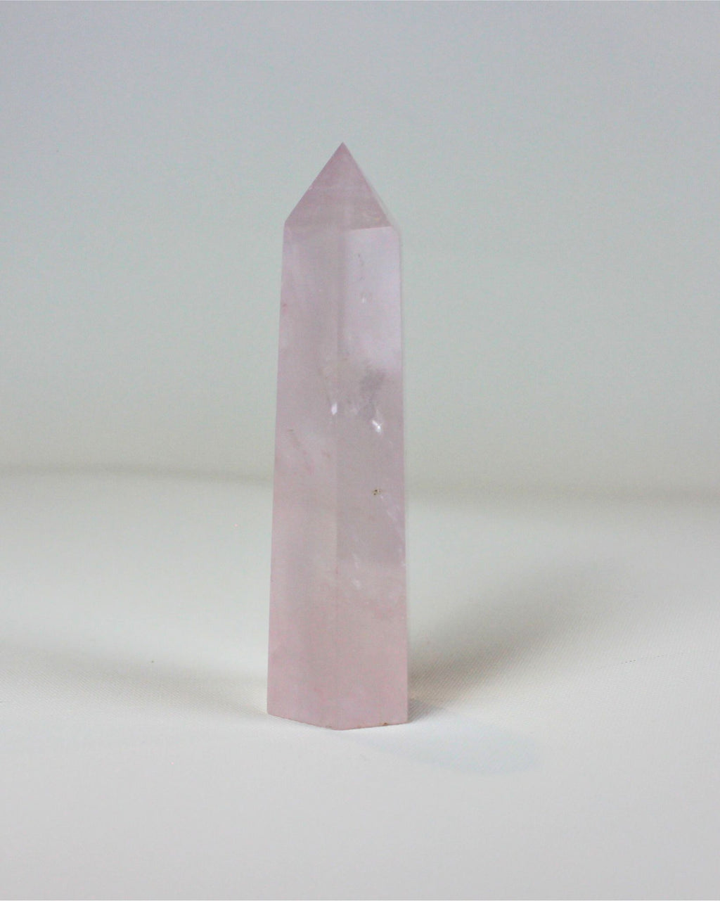 Rose quartz tower crystal, a unique and elegant decorative piece for home, office, or NZ gift boxes – perfect for crystal collectors and thoughtful keepsakes.