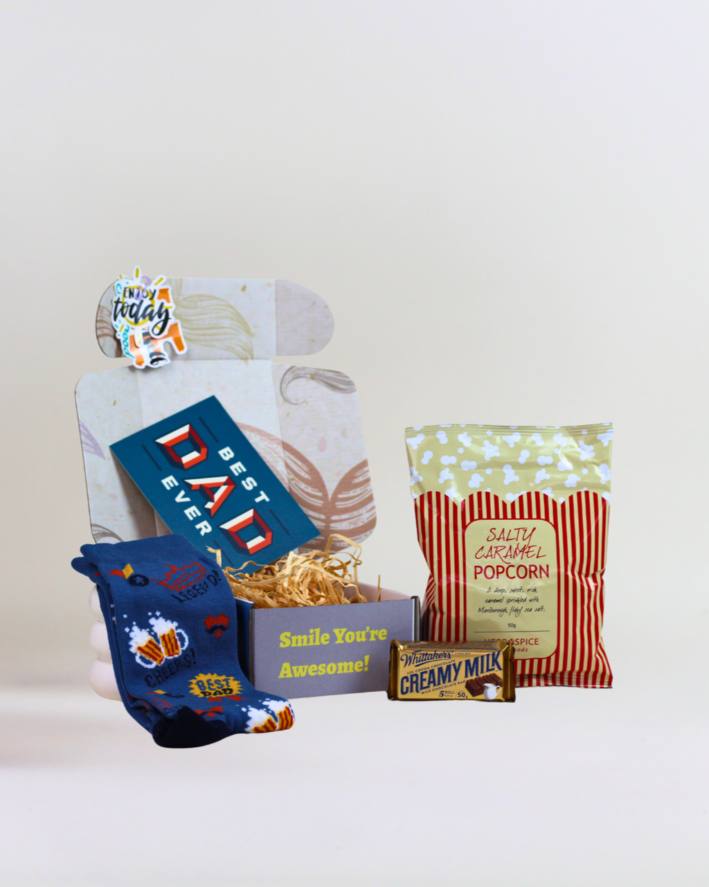 Sock It to 'Em gift box featuring Bamboozld bamboo socks, Herb & Spice Fine Foods salted caramel popcorn, Whittaker's Creamy Milk Chocolate and a personalised gift card in an A Box-Full signature gift box.