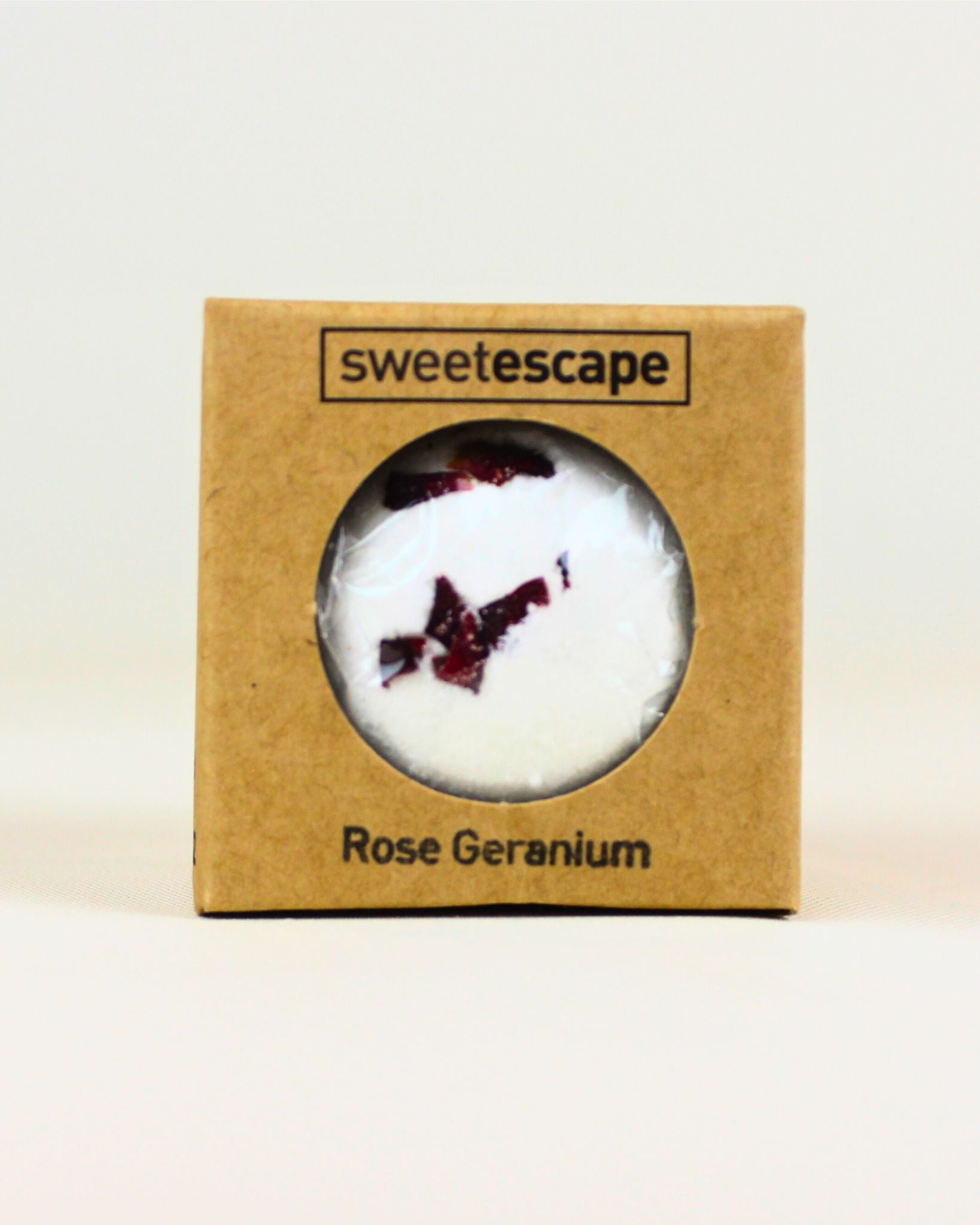 Sweet Escape bath bomb with rose and geranium – a relaxing, fragrant treat for self-care and pampering. Perfect for gift boxes, hampers, and thoughtful wellbeing gifts NZ. Ideal for creating a luxurious, calming bath experience.
