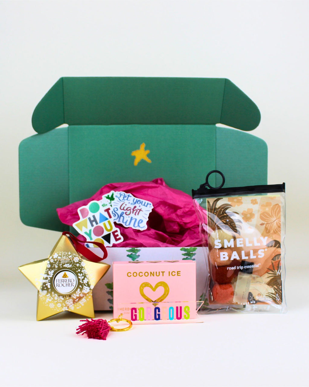 Give the gift of fun and festive freshness with The Festive Fresh & Fabulous Christmas Box, featuring a Smelly Balls air freshener (Sunbeam or Coastal Drift), a Gorgeous keyring, Ferrero Rocher, and coconut ice. A cute, uplifting Christmas treat.