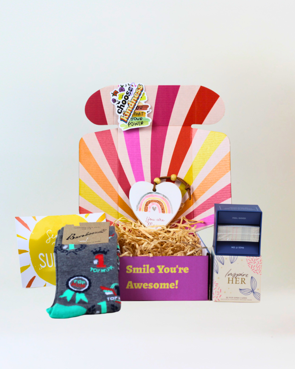 Top Mum gift box featuring 30 pop open inspiration cards, You Are Magic ceramic heart keepsake, Top Mum or Bumble Bee socks, positive affirmation cards and a personalised gift card, beautifully presented for gifting.