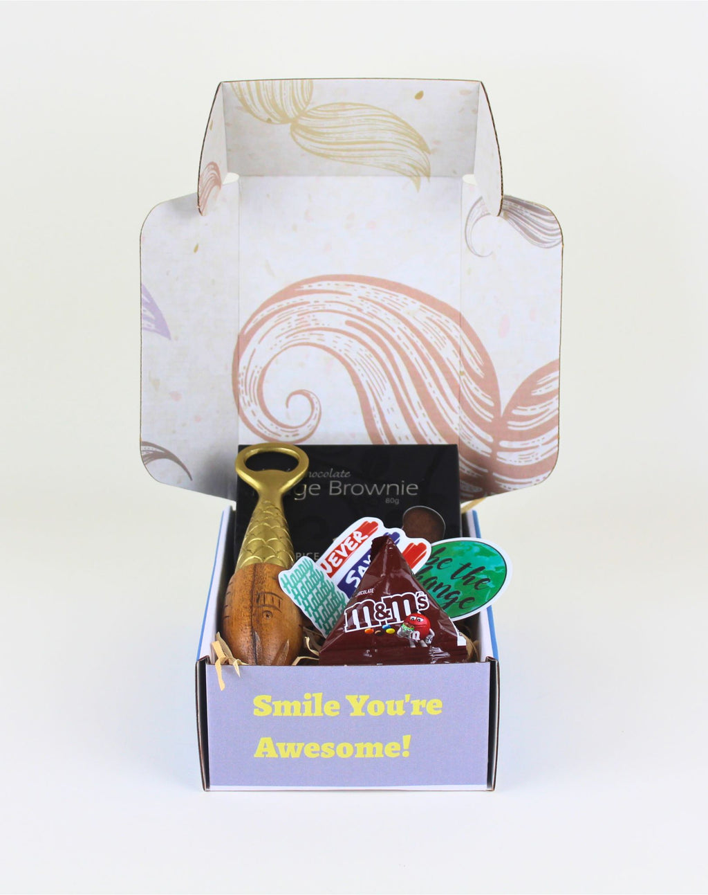 A unique men’s gift box NZ featuring a handcrafted bottle opener muddler, Herb & Spice brownie, M&M’s and a personalised card, presented in a fun moustache box with fast NZ delivery.