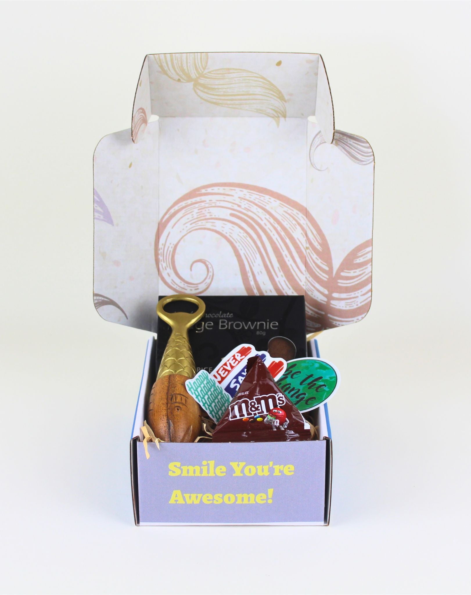 A unique men’s gift box NZ featuring a handcrafted bottle opener muddler, Herb & Spice brownie, M&M’s and a personalised card, presented in a fun moustache box with fast NZ delivery.