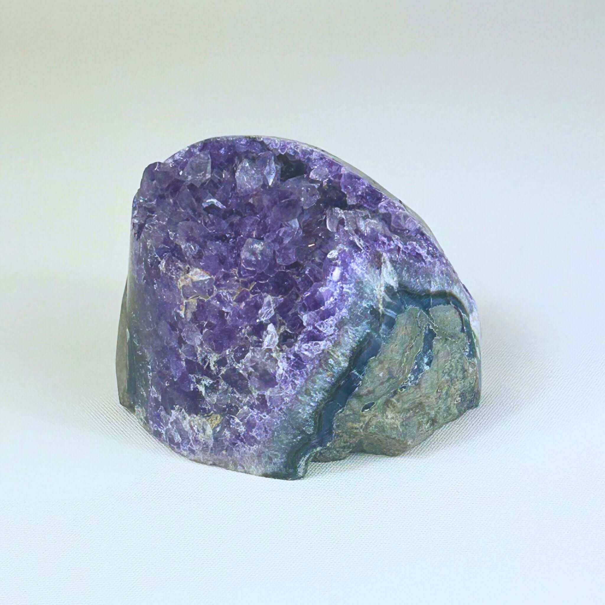 Amethyst gemstone cluster with deep purple tones, a standout choice for unique crystal gifts New Zealand.