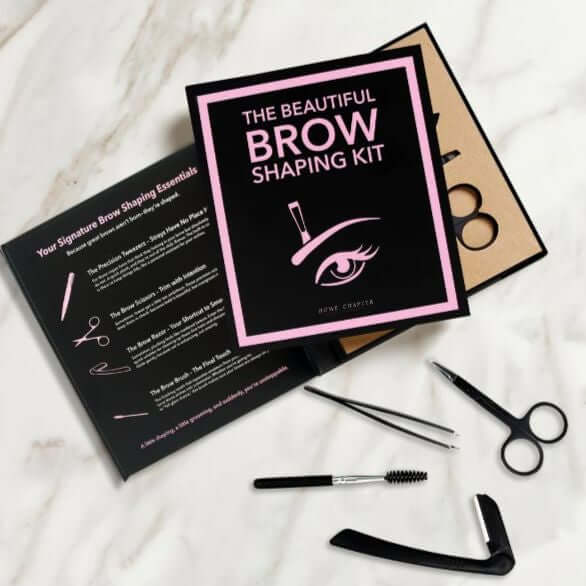 Gifts For Her NZ Beautiful Brow Shaping Kit 4-piece grooming set in stylish book-style box with brush, razor, scissors, and tweezers.