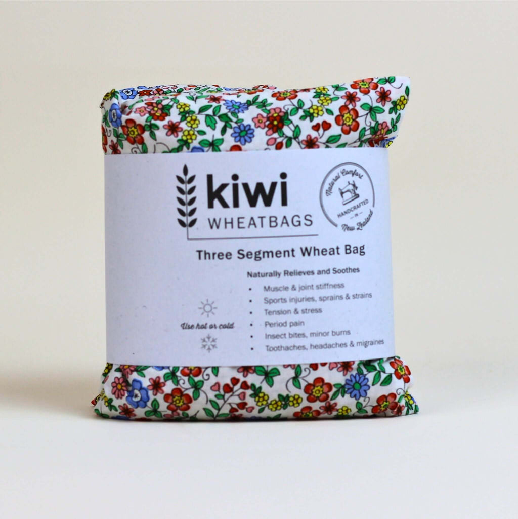 Handcrafted 3 Segment Wheatbag NZ – cosy, stylish, and available in Dusty Pink, Daisy, or Blue Plaid. One of the best Wellbeing Gifts NZ for thoughtful comfort and mindful moments.