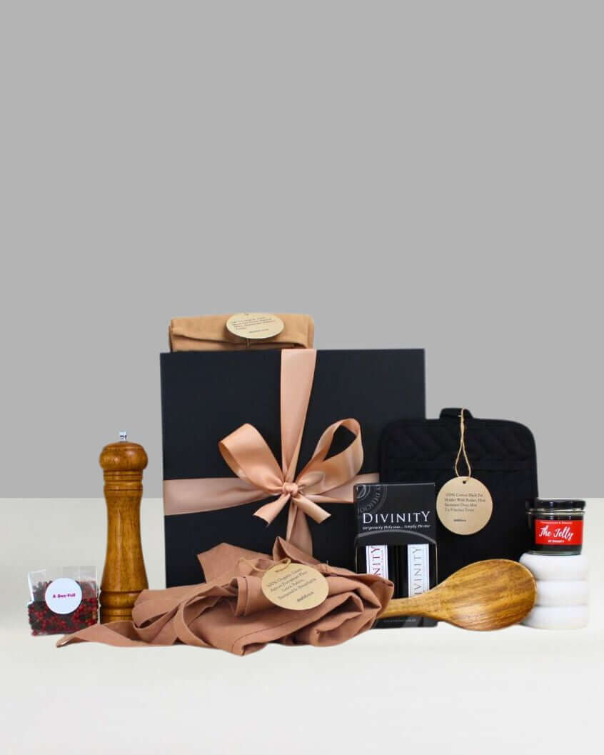 Premium kitchen essentials housewarming box – thoughtful Settlement and Thank You Gift NZ with apron, olive oil, pepper mill, and gourmet treats
