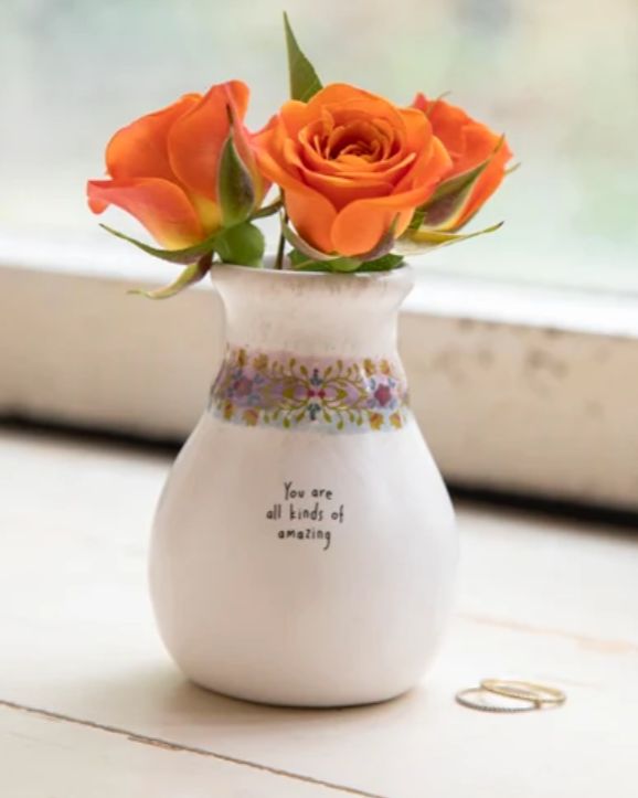 Small ceramic bud vase with the message ‘You Are All Kinds of Amazing’, a thoughtful keepsake gift for friends, birthdays, and meaningful NZ gift boxes.