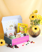 Box-Full of Sunshine Gift Box NZ – cheerful candle, treats, tea, mug, and personalised card, beautifully packaged for NZ-wide delivery, perfect for birthdays or just-because gifts.
