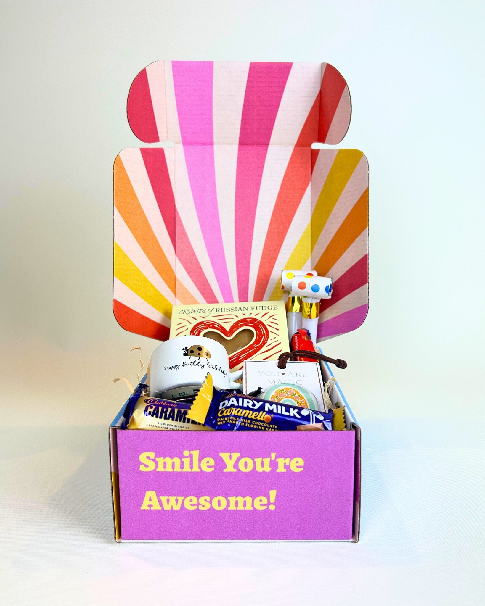 Small playful gift box NZ – Fun Celebration Gift Box with treats, keepsakes, and personalised card, perfect for birthdays or just-because gifts across New Zealand.
