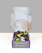 Fun lolly gift box NZ filled with colourful chewy lollies in a playful moustache themed gift box.